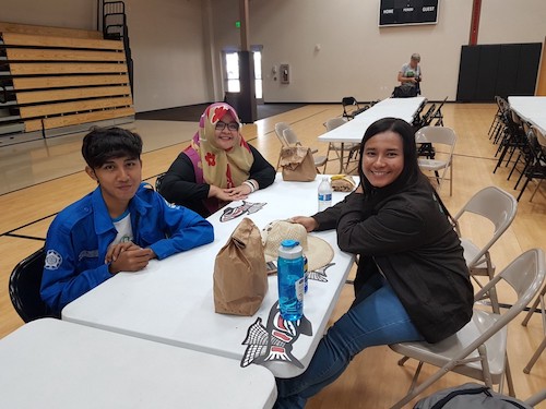 Ms. Saraswati with two other students at the Tribal Climate Camp in Eatonville, United States. /©UN CC:Learn