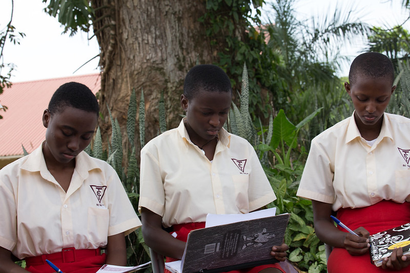 Pupils at Trinity College Nabbingo in Uganda prepare questions on climate change ahead of their Youth Climate Dialogue with students in France (Photo: UNITAR)