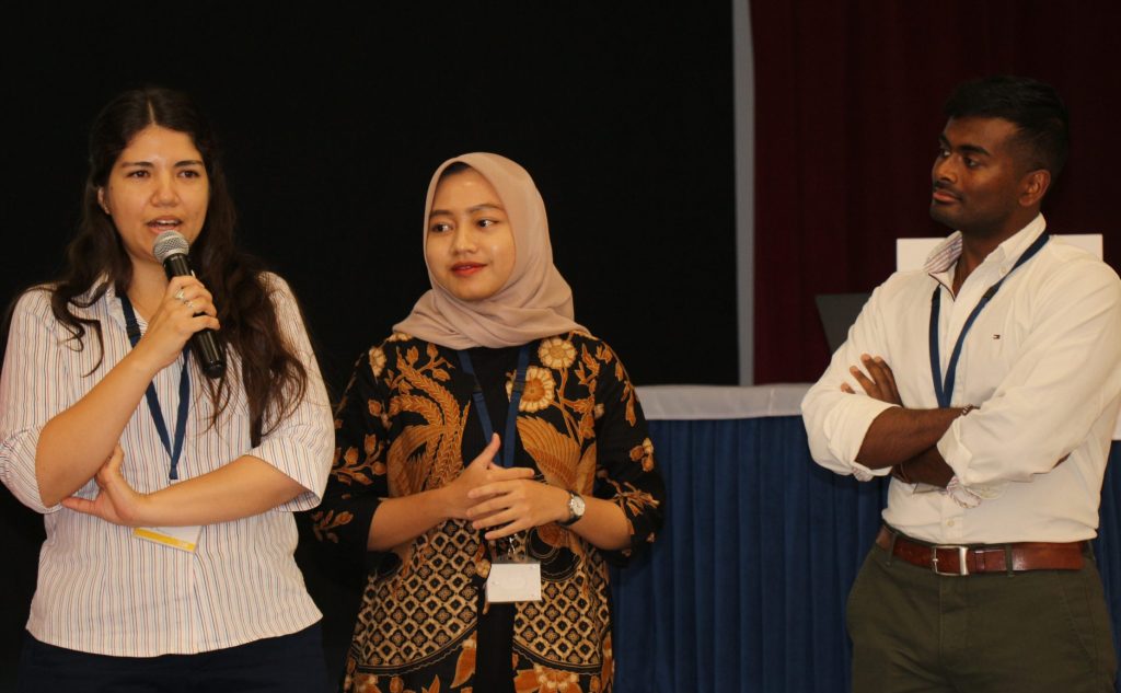 Climate Youth Negotiators speaking at the simulation in Dubai, UAE, during COP28.