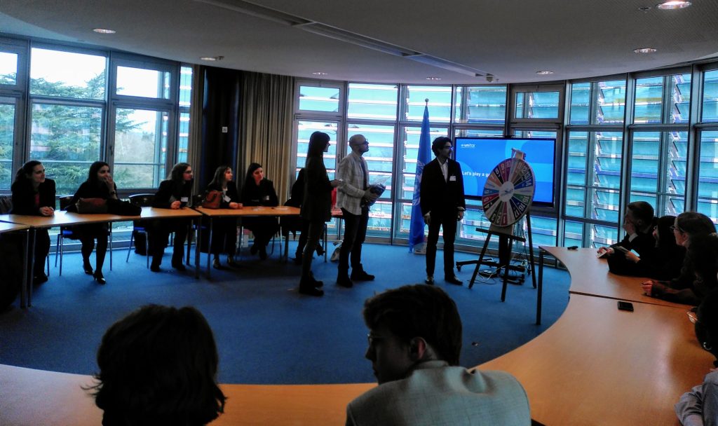 Students during the SDG game during the visit to the UNITAR office.
